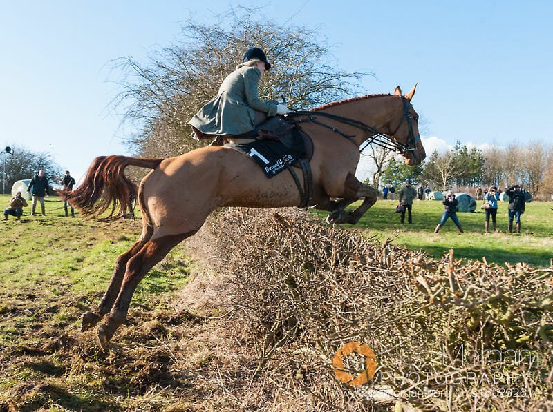 Philippa Holland taking part in the side saddle race