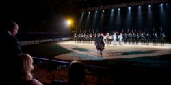 Terry Spraggett receives the salute from the Household Cavalry - Horse of the Year Show