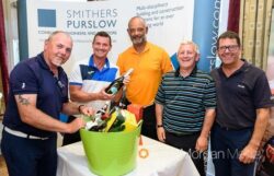 Award winning teams celebrating with Dean Headley