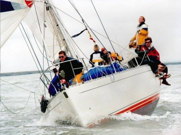 Nico working the bow of the Sigma 38 Bullwinkle as a teenager.