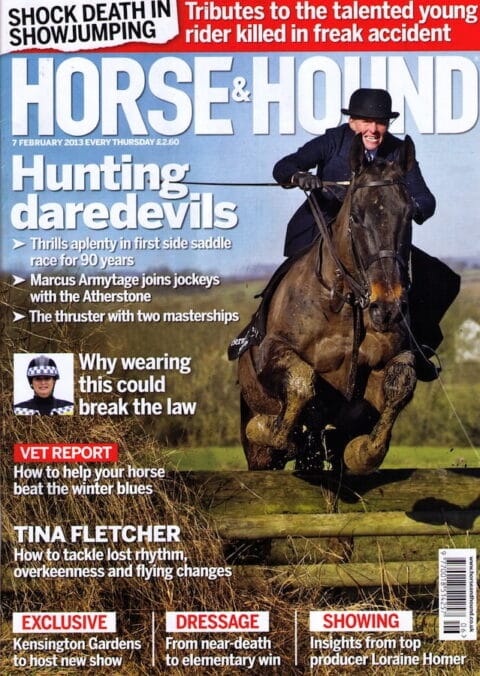 Equine Photographer in Leicestershire - Horse & Hound cover 7 February 2013- Lizzie Harris riding sidesaddle over a hedge
