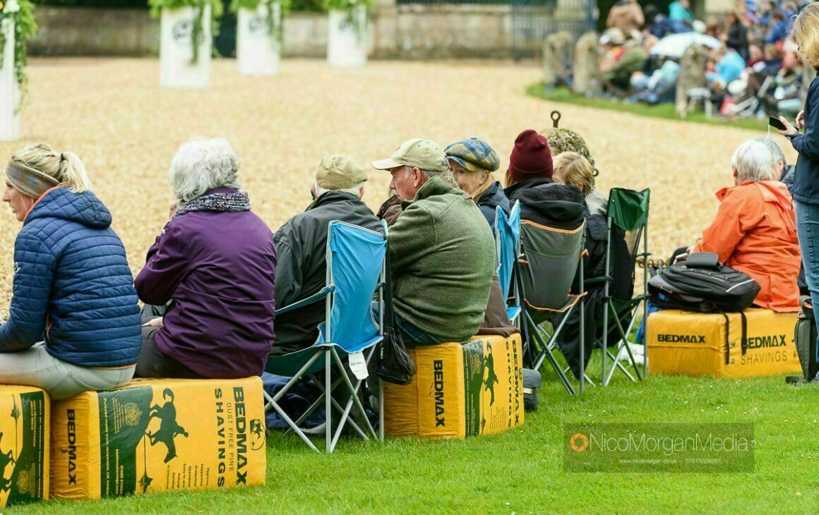 Spectators at Badminton Trot Up on Bedmax Bales
