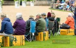 Spectators at Badminton Trot Up on Bedmax Bales