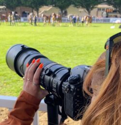 Redhead photographer shoots showing from outside the ring
